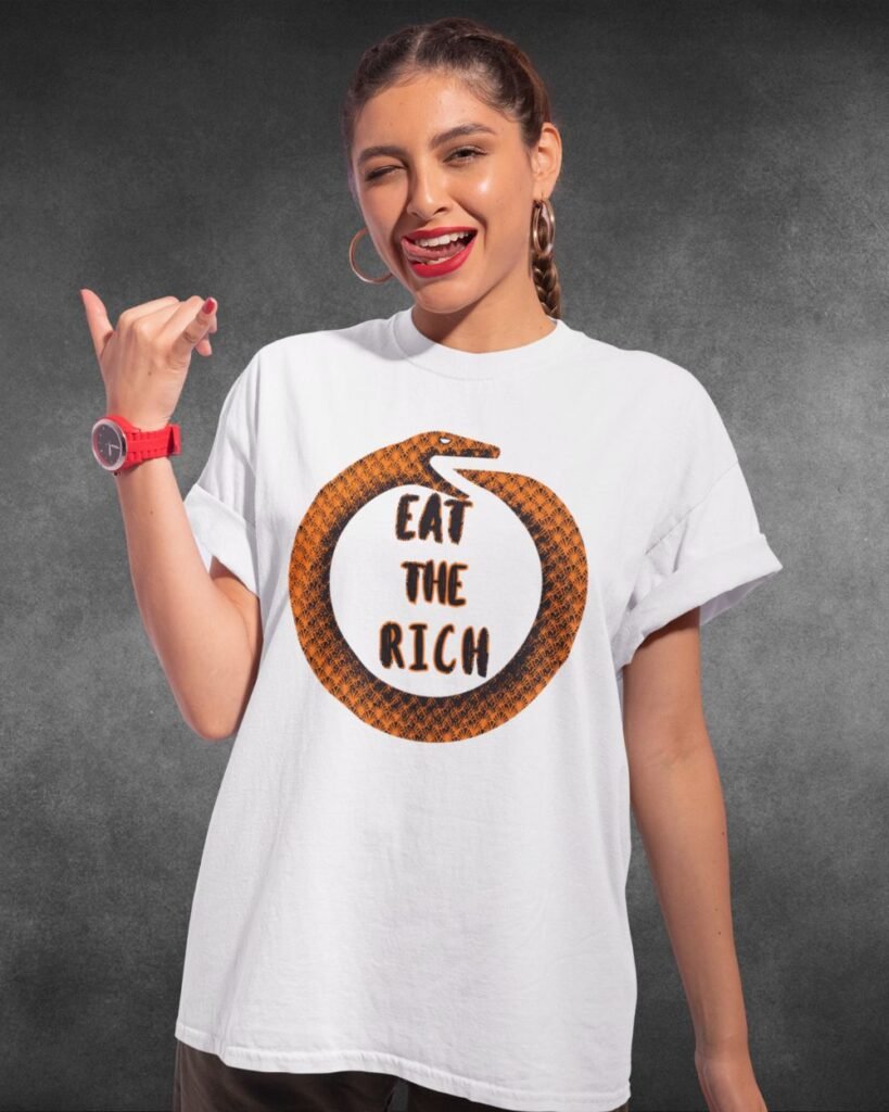 sassy woma n in white Eat The Rich tee Orange Ouroboros edition